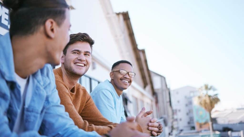 A young man with his friends.